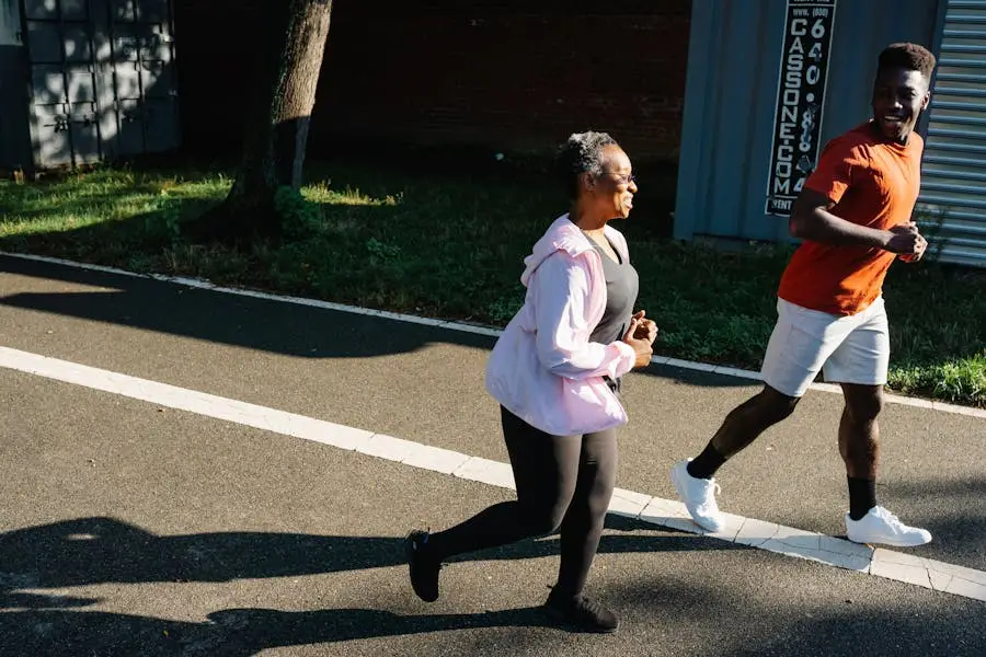 Two adults jogging outdoors on a sunny day, embracing a healthy lifestyle with smiles.